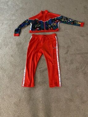 Nike Red Track Pants with Floral Accent Zip Jacket